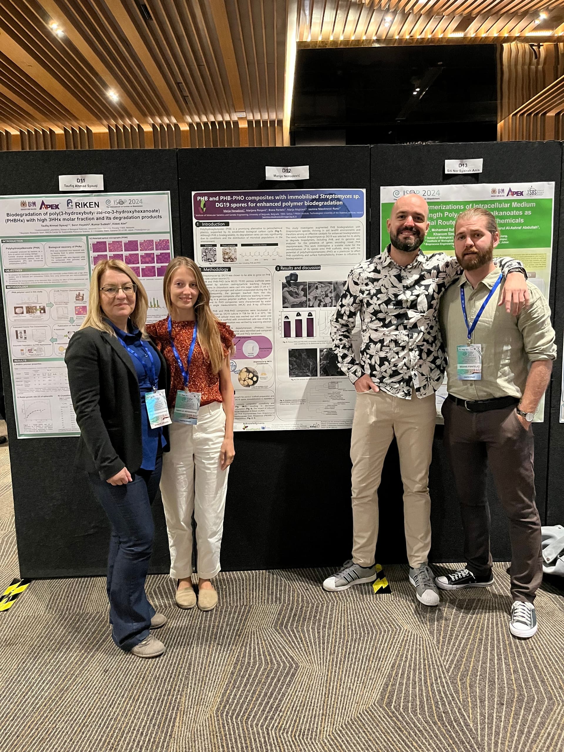 Photo of Jasmina Nikodinovic-Runic, the D12 poster presenting author Marija Nenadovic, Dusan Milivojevic and co-author Brana Pantelic IMGGE with the poster “PHB and PHB-PHO composites with immobilized Streptomyces DG19 spores for enhanced polymer biodegradation”.
